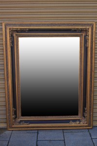 We have a beautiful wooden gilt framed beveled edge ornate mirror in lovely condition with very minor but repairable damage.
Dimensions:  127cm , wide ,176cm  high £250